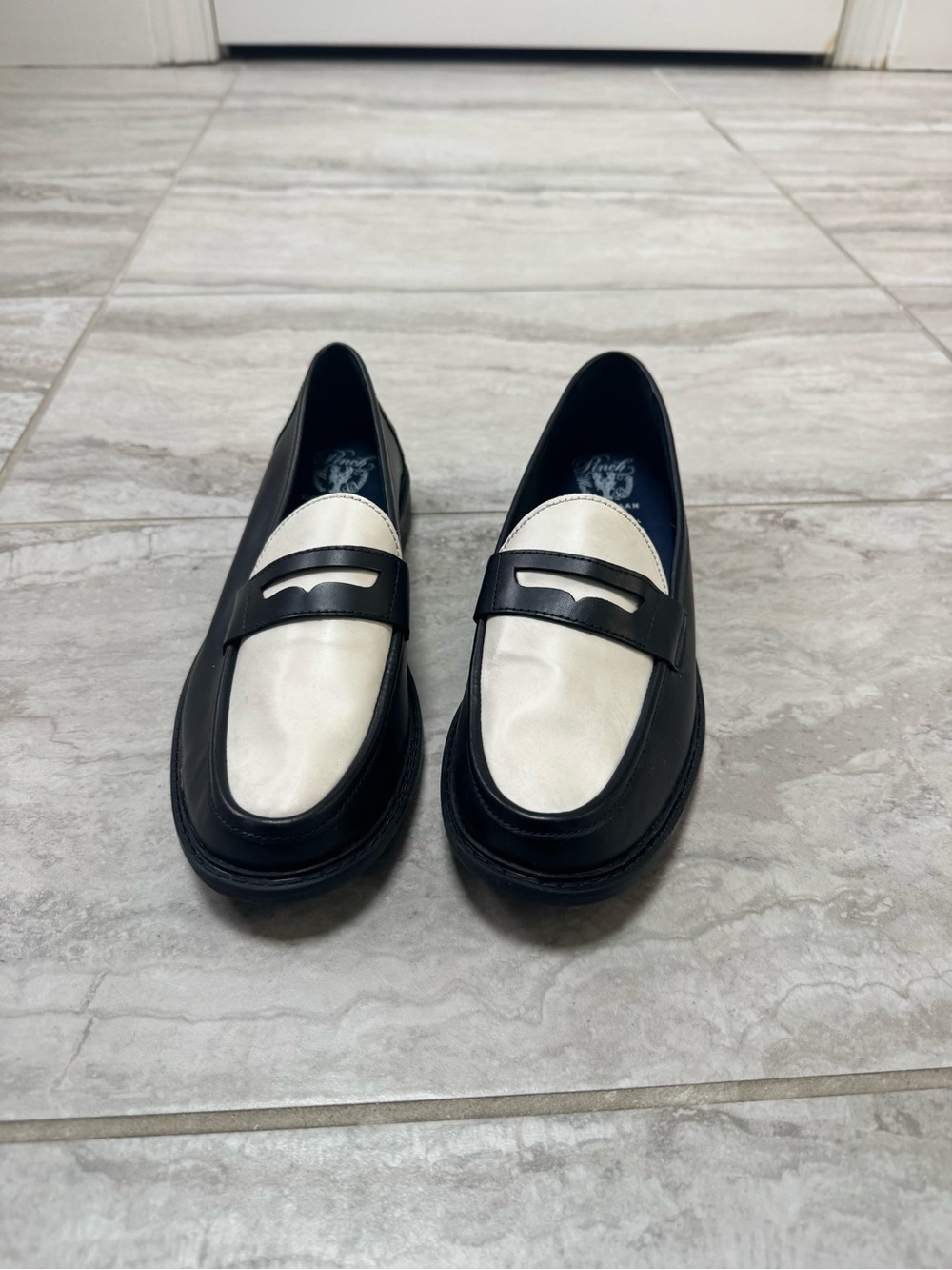 Cole Haan Black and White Leather Penny Loafers